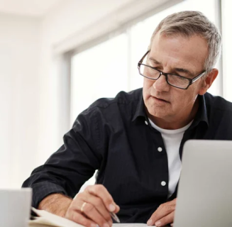 man working with laptop