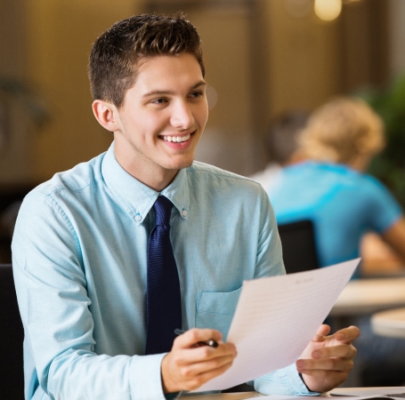 young man with a resume